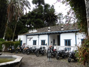 Group of motorcycles parked outside Hacienda Pinsaqui in Ecuador